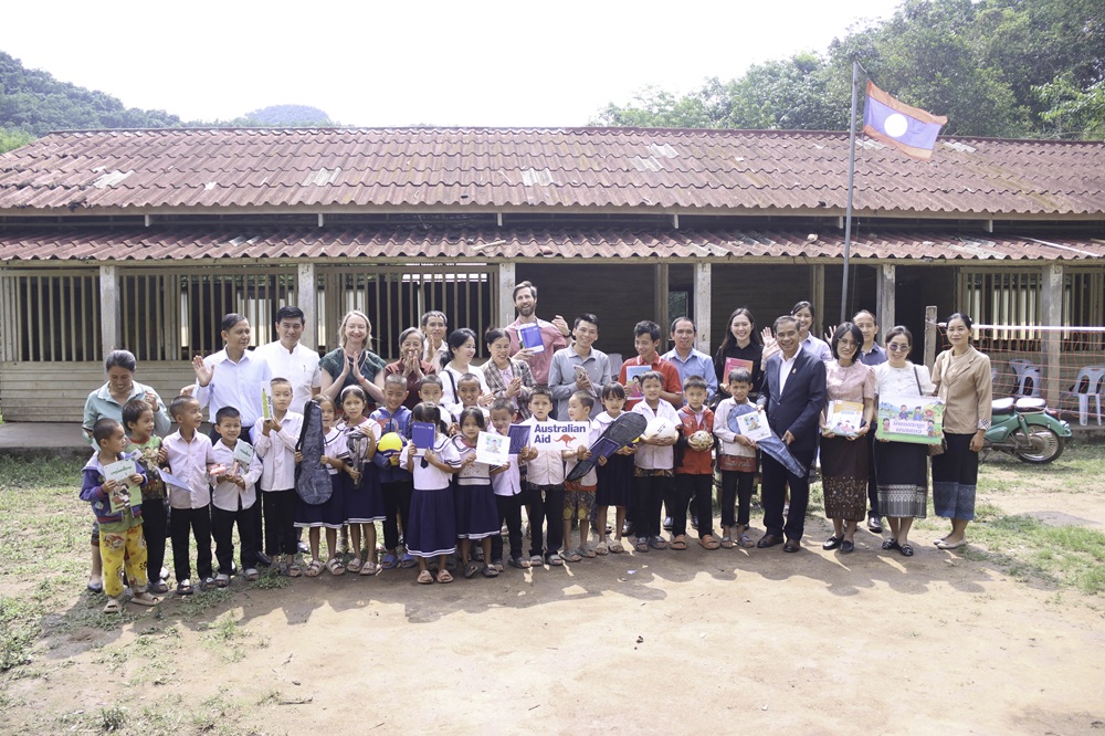 Children were happy to receive learning materials and sports equipment from the delegation